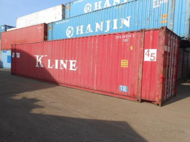 Shipping containers in a yard, illustrating supplier verification in Vietnam