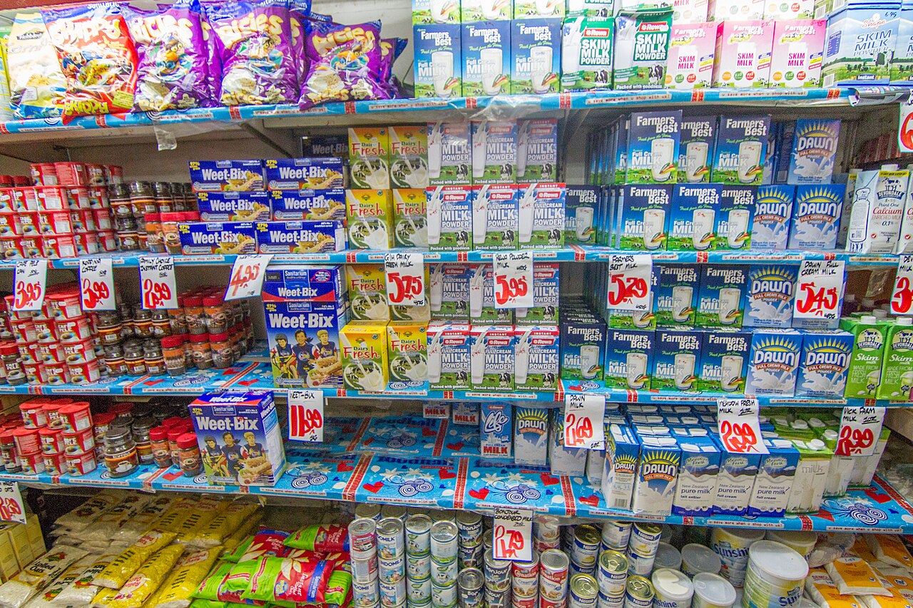Shopper in a supermarket making a purchase decision