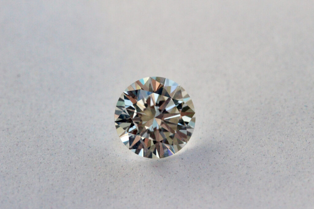 PNJ P-Lab diamond certification scandal: a round brilliant cut diamond under gemological inspection